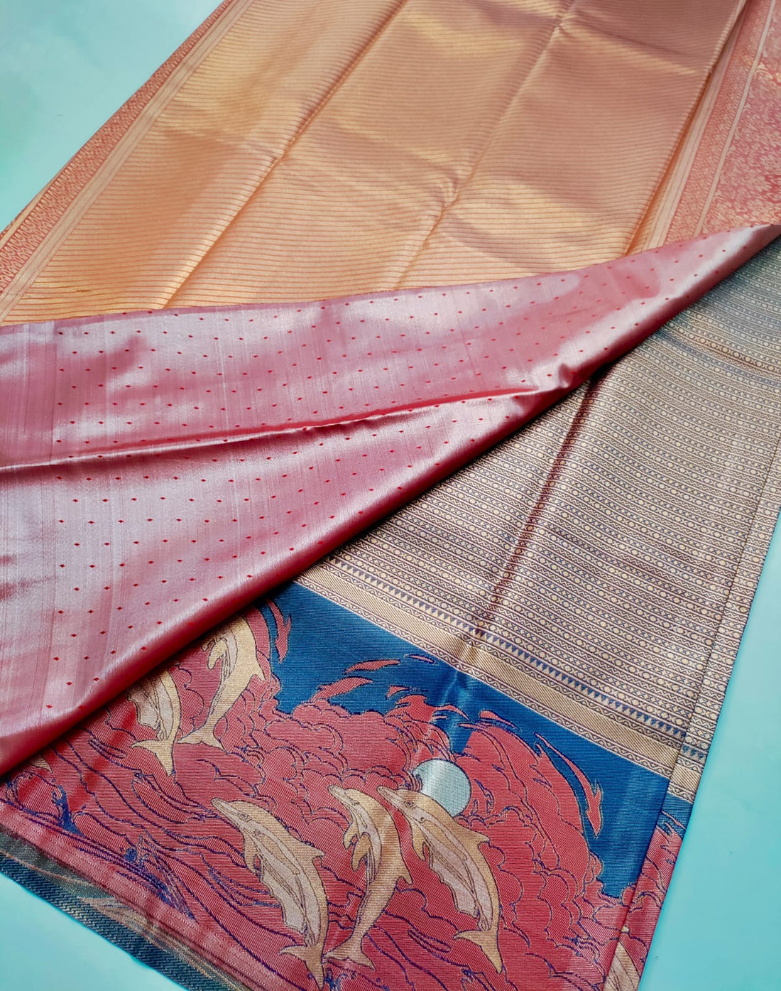 Royal Waves – Vasthrakala Silk Wedding Saree with Dolphin Design