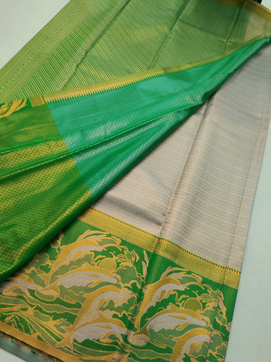 Royal Emerald Vasthrakala Silk Wedding Saree – Dolphin Motif Edition