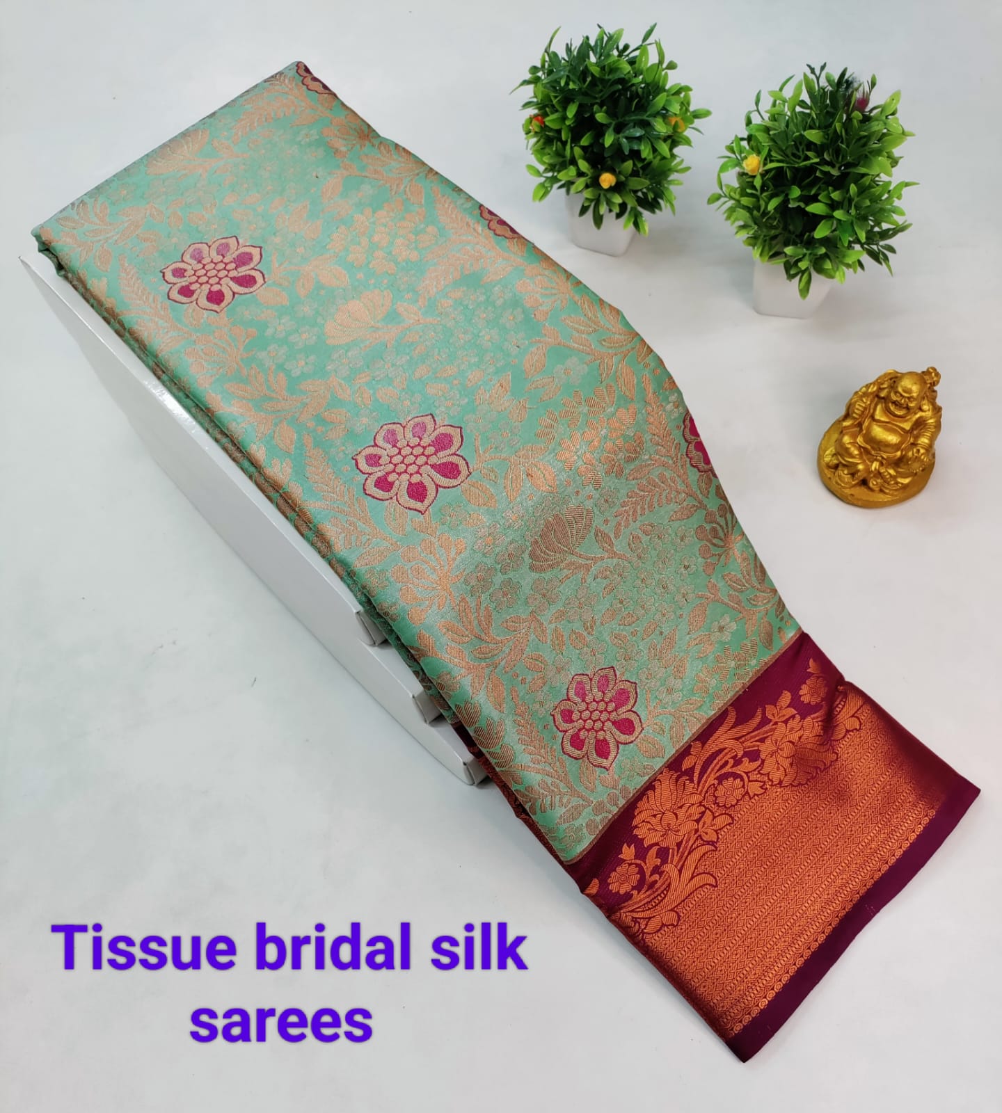 Rexona with Maroon Kanjeevaram Tissue Silk Saree